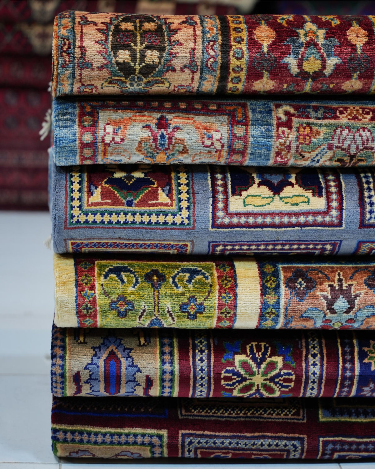 Multicolour 100% Handmade wool Rug with Navy Border and Tasselled Ends