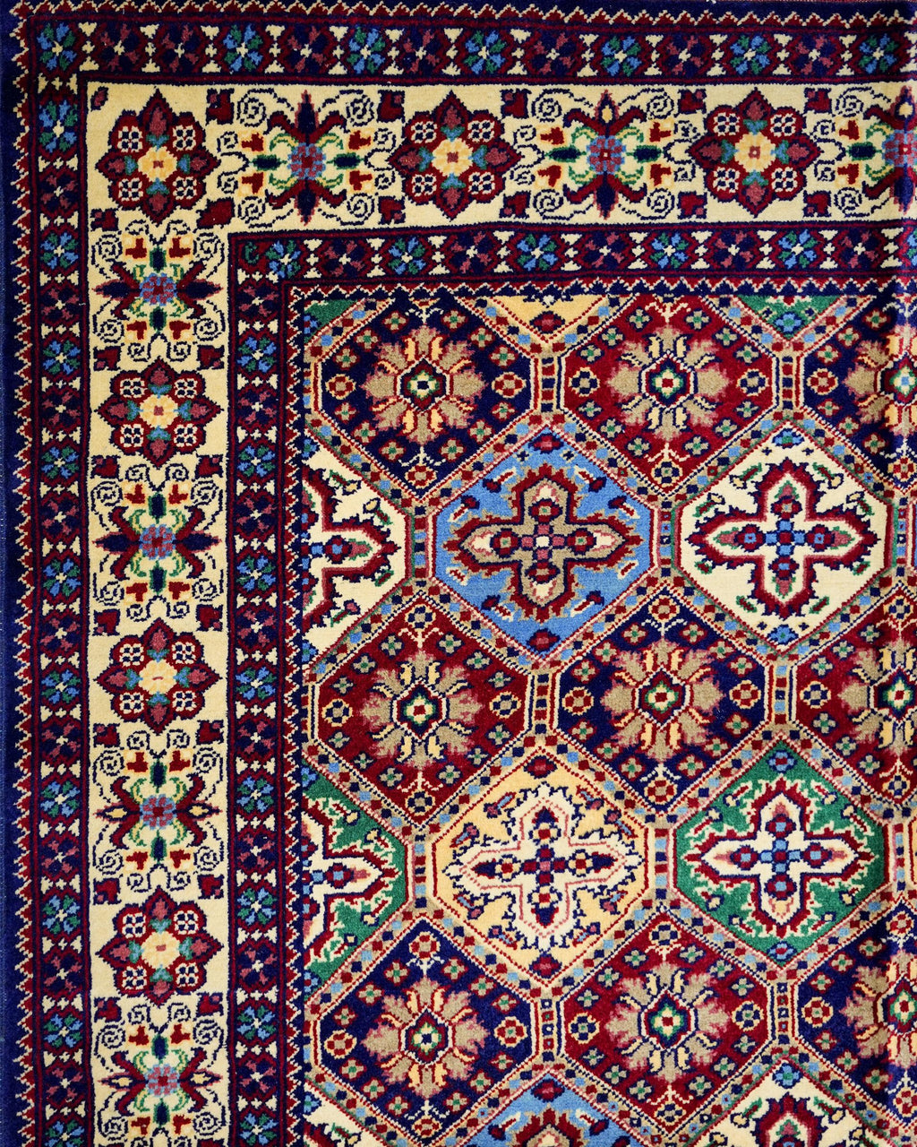 Handmade Bokhara Rug | Deep Blue Field with Red & Gold Octagon Medallions | Wool Rug