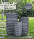 The Horizon Series set of 3 tall ribbed U-shape planters on outdoor lawn