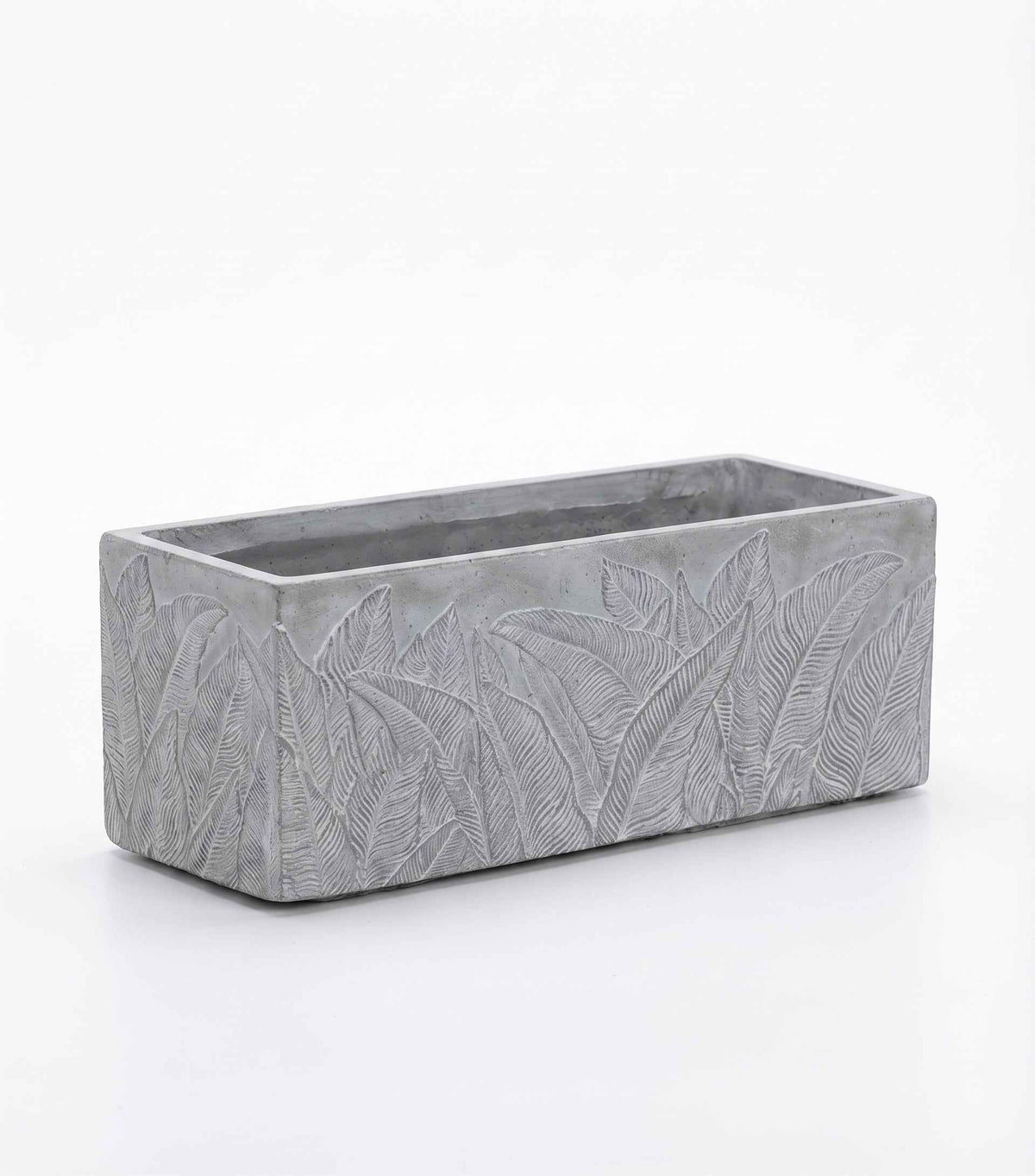 Close-up view of Botanical Trough Series palm leaf rectangular planters designed for contemporary decor