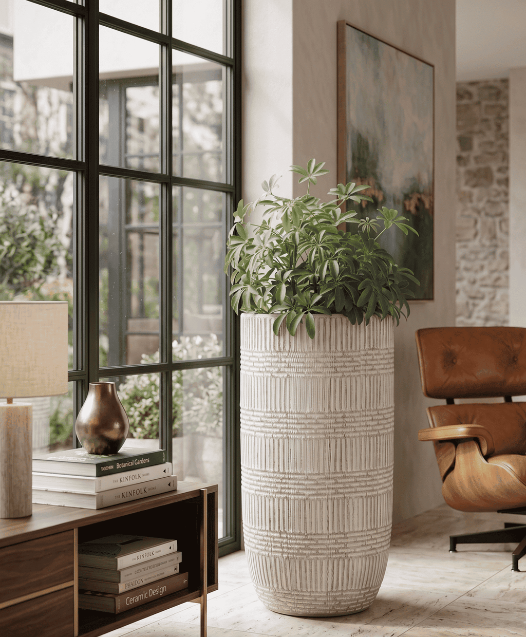Durable geometric textured planter pots styled elegantly on a bright patio deck