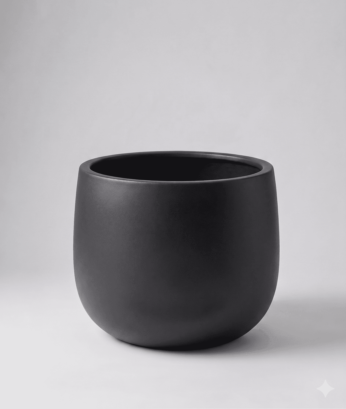 Close-up of premium black cone planters ideal for indoor and outdoor plant decor
