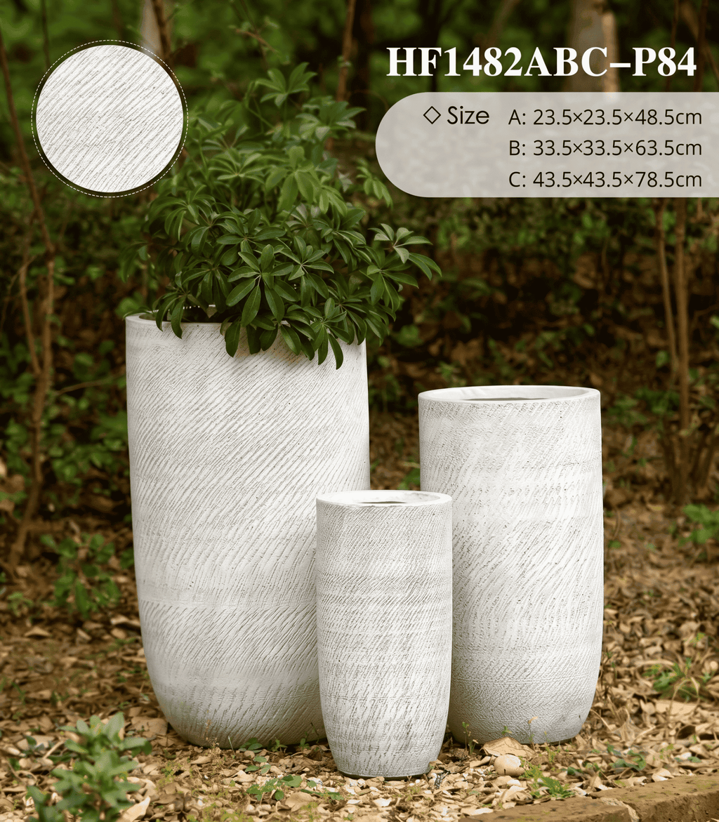Three textured planters of different sizes in a garden setting with product details.